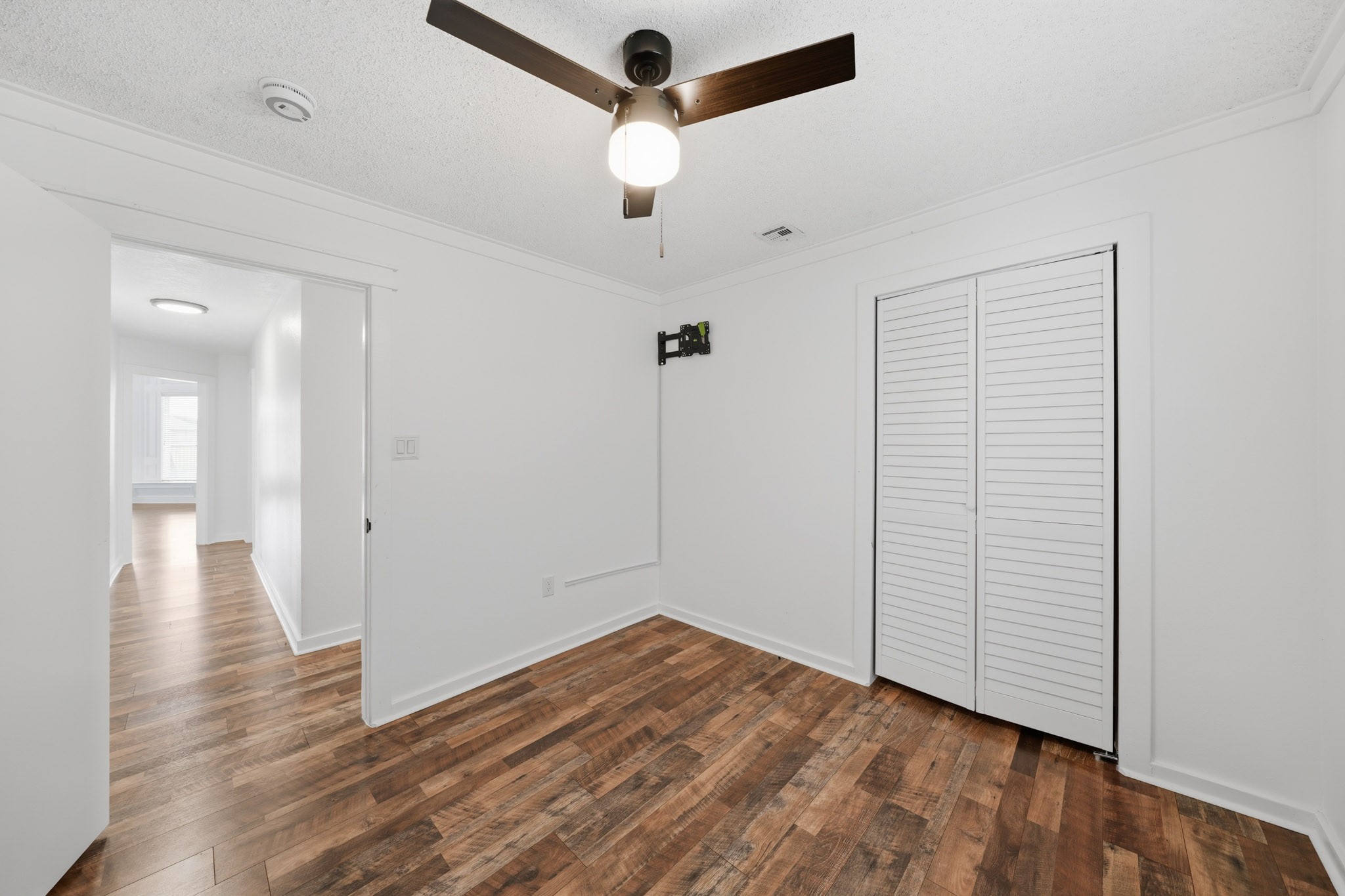 79 Summers Wind Street Conroe, TX 77356 - Photo 28 of 45 a view of empty room with wooden floor