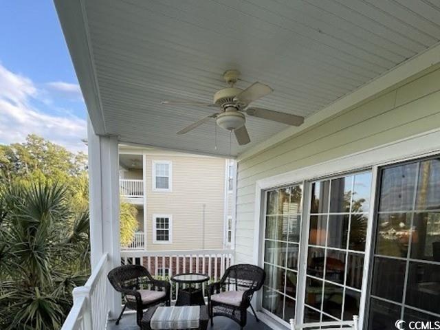 1008 Ray Costin Way, Unit 310 Murrells Inlet, SC 29576 - Photo 31 of 40 Balcony featuring ceiling fan