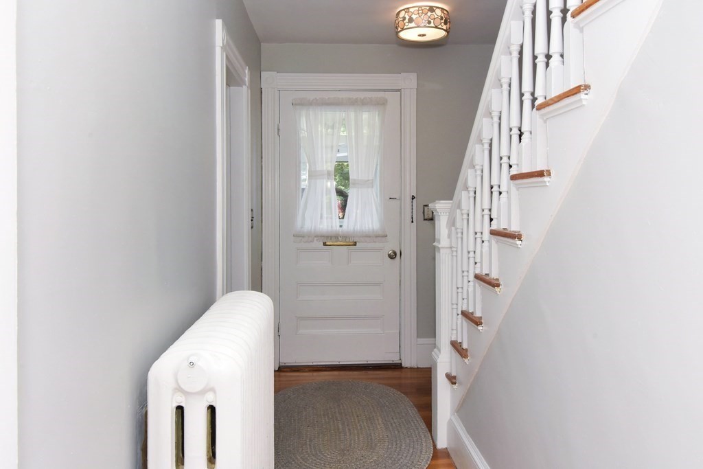18 High Street Saugus, MA 01906 - Photo 19 of 35 a view of hallway with stairs