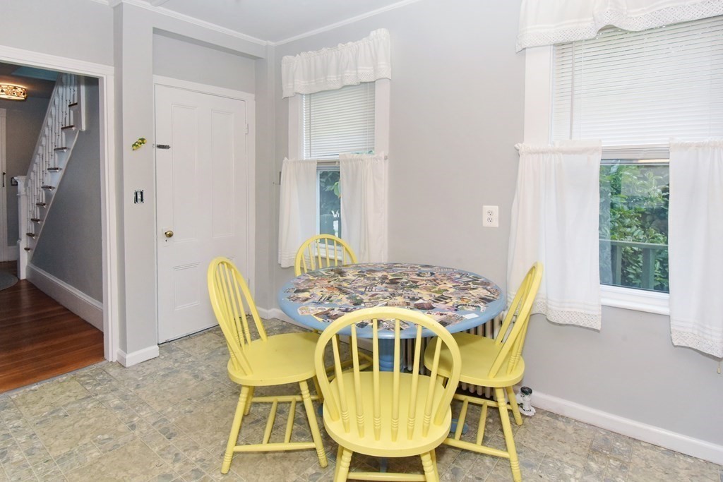18 High Street Saugus, MA 01906 - Photo 9 of 35 a view of a dining room with furniture and wooden floor