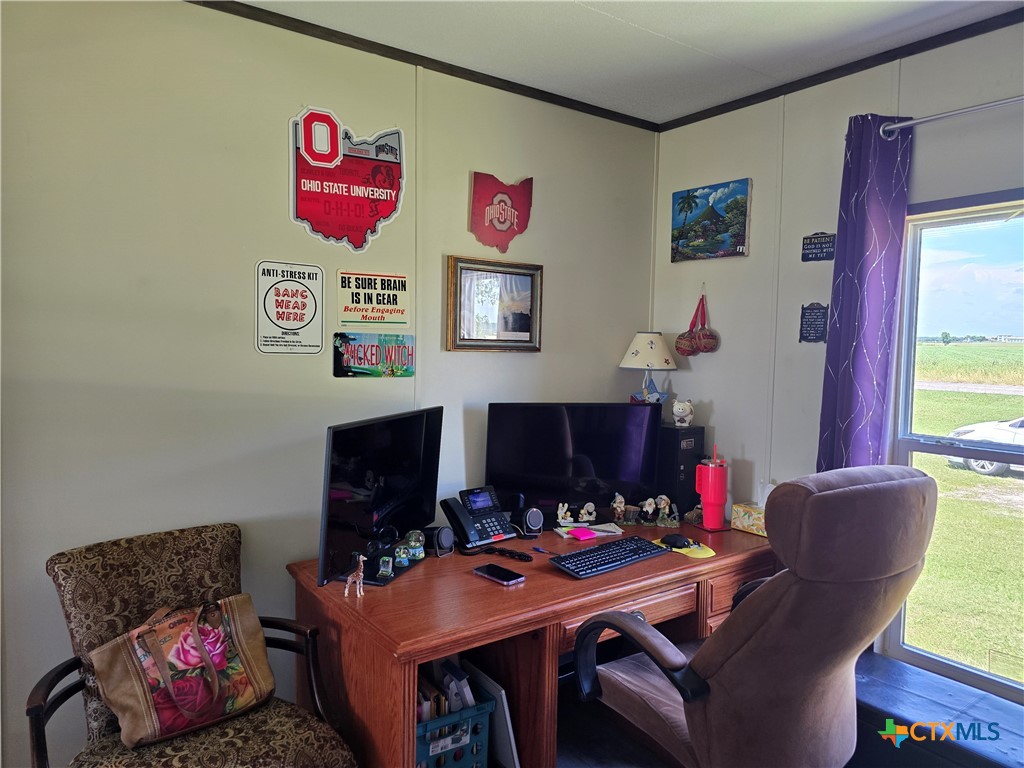 412 Coryell City Road Gatesville, TX 76528 - Photo 18 of 34 a room with furniture and a flat screen tv