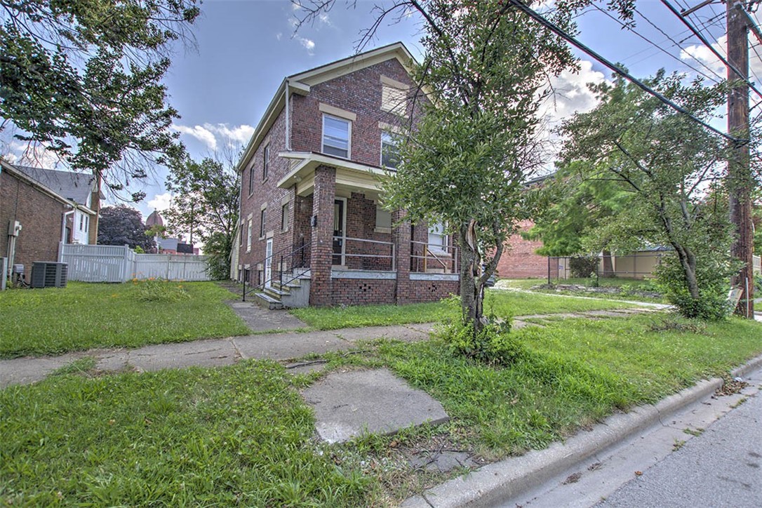 340 North Edward Street Decatur, IL 62522 - Photo 2 of 20 a brick building with a yard