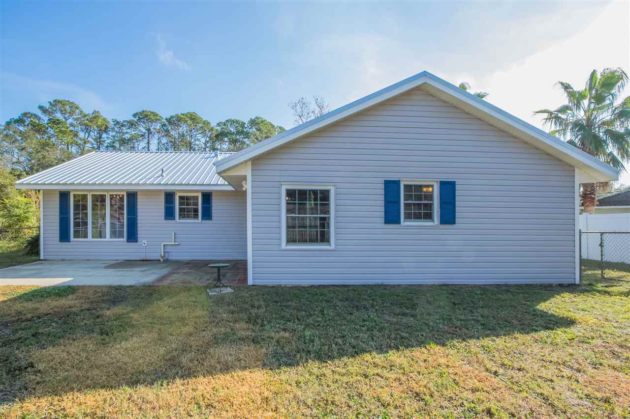 626 Queen Road St. Augustine, FL 32086 - Photo 8 of 30 a view of a house with a yard