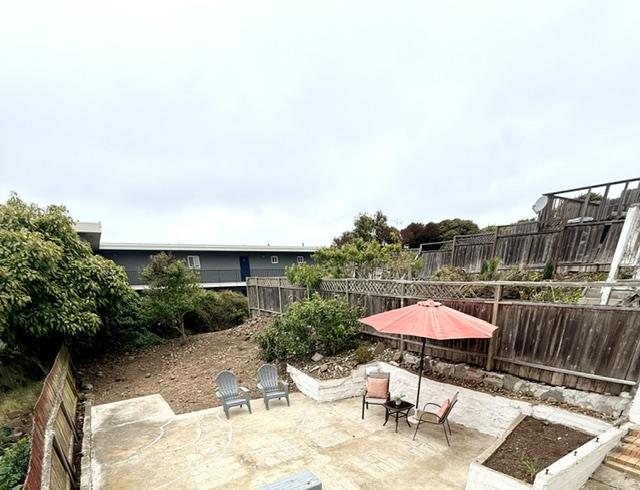 135 Bepler Street Daly City, CA 94014 - Photo 23 of 34 a patio with table and chairs