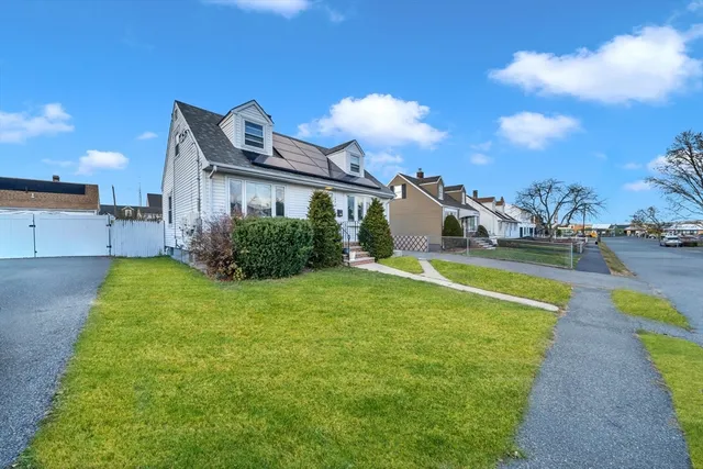 a view of a house with a swimming pool