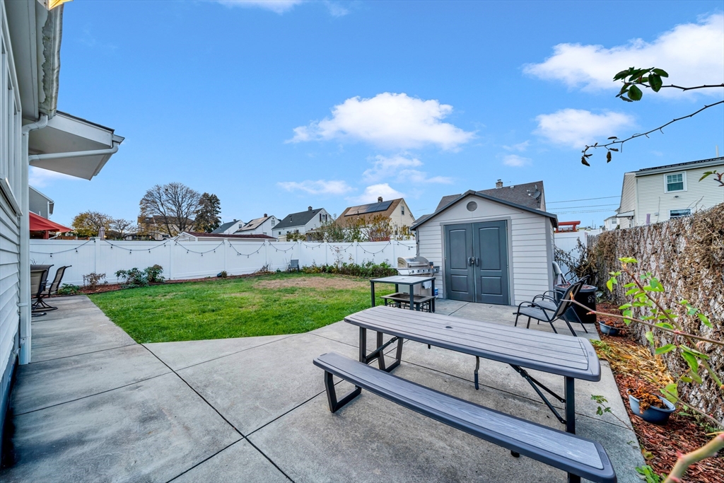 144 Orvis Road Revere, MA 02151 - Photo 38 of 42 a view of a bench in the garden