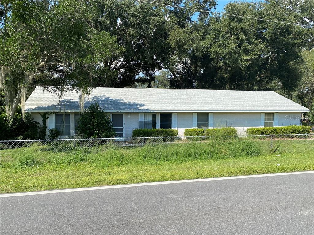 35307 Lake Unity Road Fruitland Park, FL 34731 - Photo 1 of 1 a front view of a house with a yard