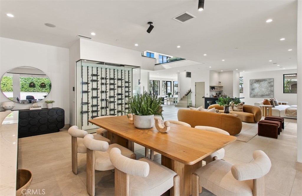1210 Kings Road Newport Beach, CA 92663 - Photo 13 of 50 a living room with furniture kitchen view and a large window