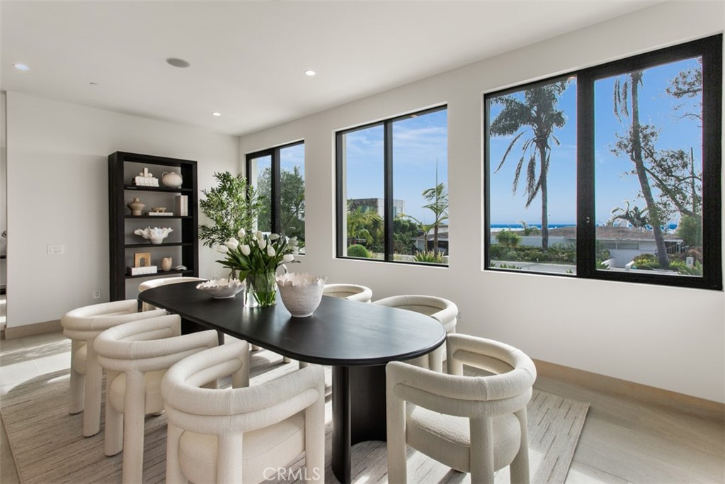 1210 Kings Road Newport Beach, CA 92663 - Photo 18 of 50 a dining room with furniture and window