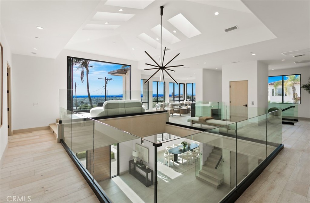 1210 Kings Road Newport Beach, CA 92663 - Photo 21 of 50 a living room with furniture and a large window