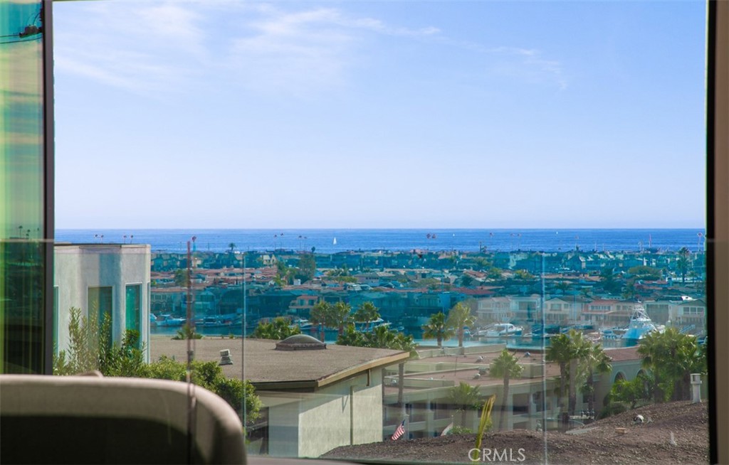 1210 Kings Road Newport Beach, CA 92663 - Photo 35 of 50 a patio with water view and a lake view