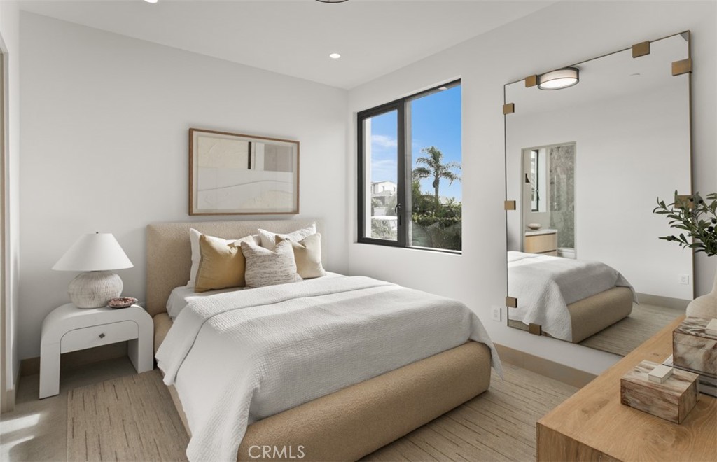 1210 Kings Road Newport Beach, CA 92663 - Photo 38 of 50 a bedroom with bed and large window