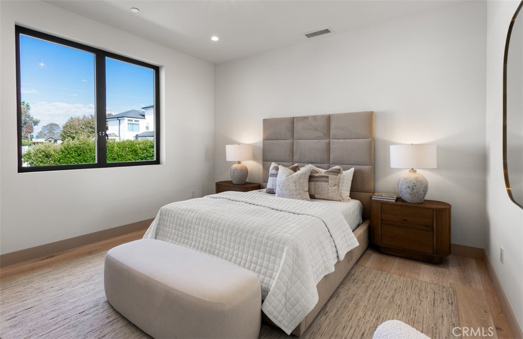 1210 Kings Road Newport Beach, CA 92663 - Photo 42 of 50 a spacious bedroom with a bed and window