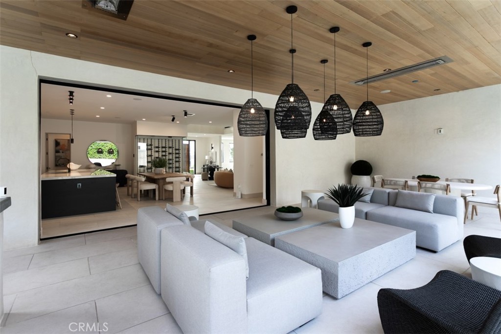 1210 Kings Road Newport Beach, CA 92663 - Photo 48 of 50 a living room with lots of furniture and view of kitchen