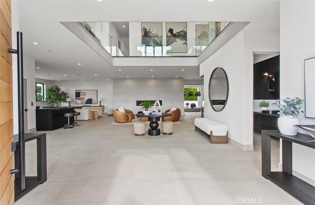 1210 Kings Road Newport Beach, CA 92663 - Photo 5 of 50 a living room with furniture and a large window