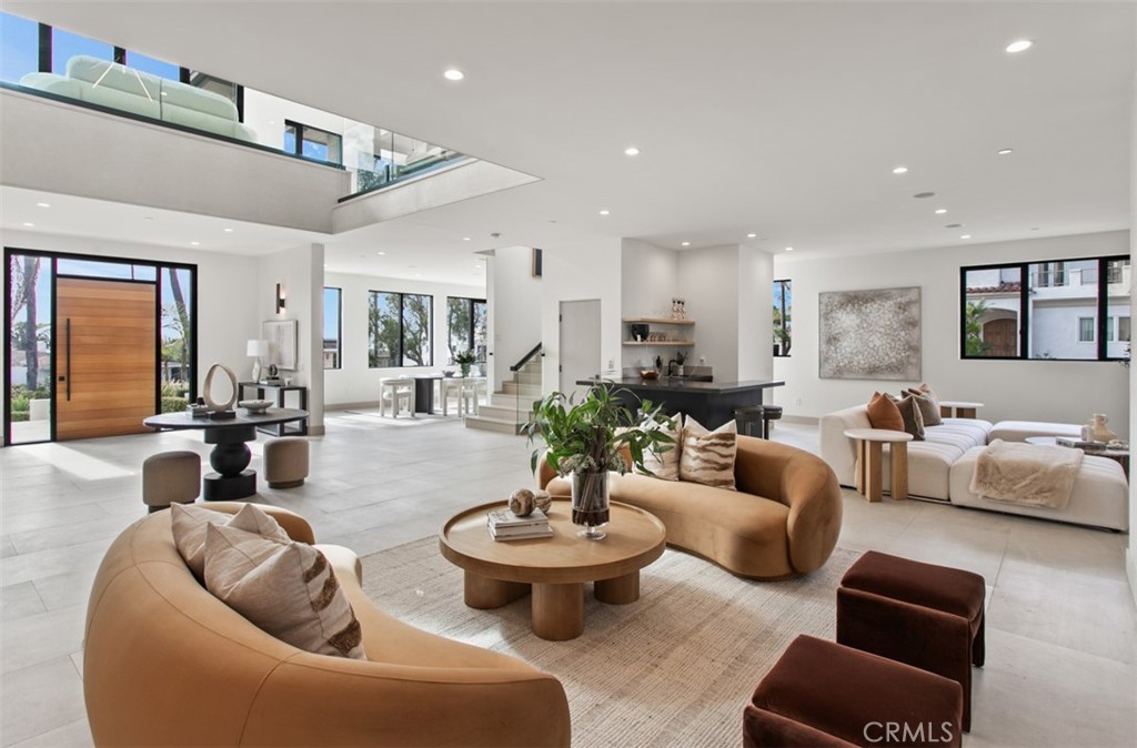 1210 Kings Road Newport Beach, CA 92663 - Photo 9 of 50 a living room with furniture and view of kitchen