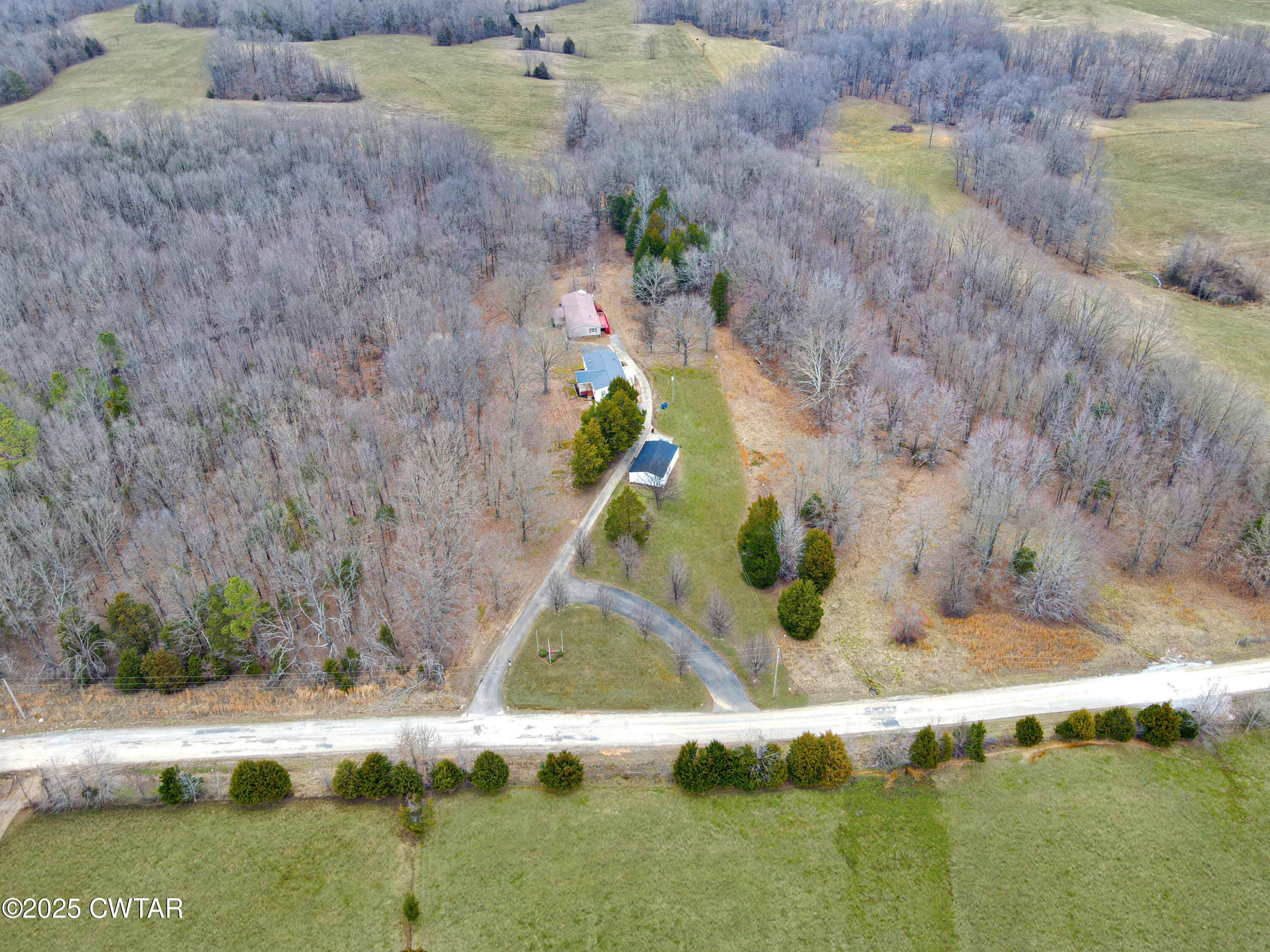 5427 Shades Bridge Road McKenzie, TN 38201 - Photo 1 of 35 a view of swimming pool with a yard