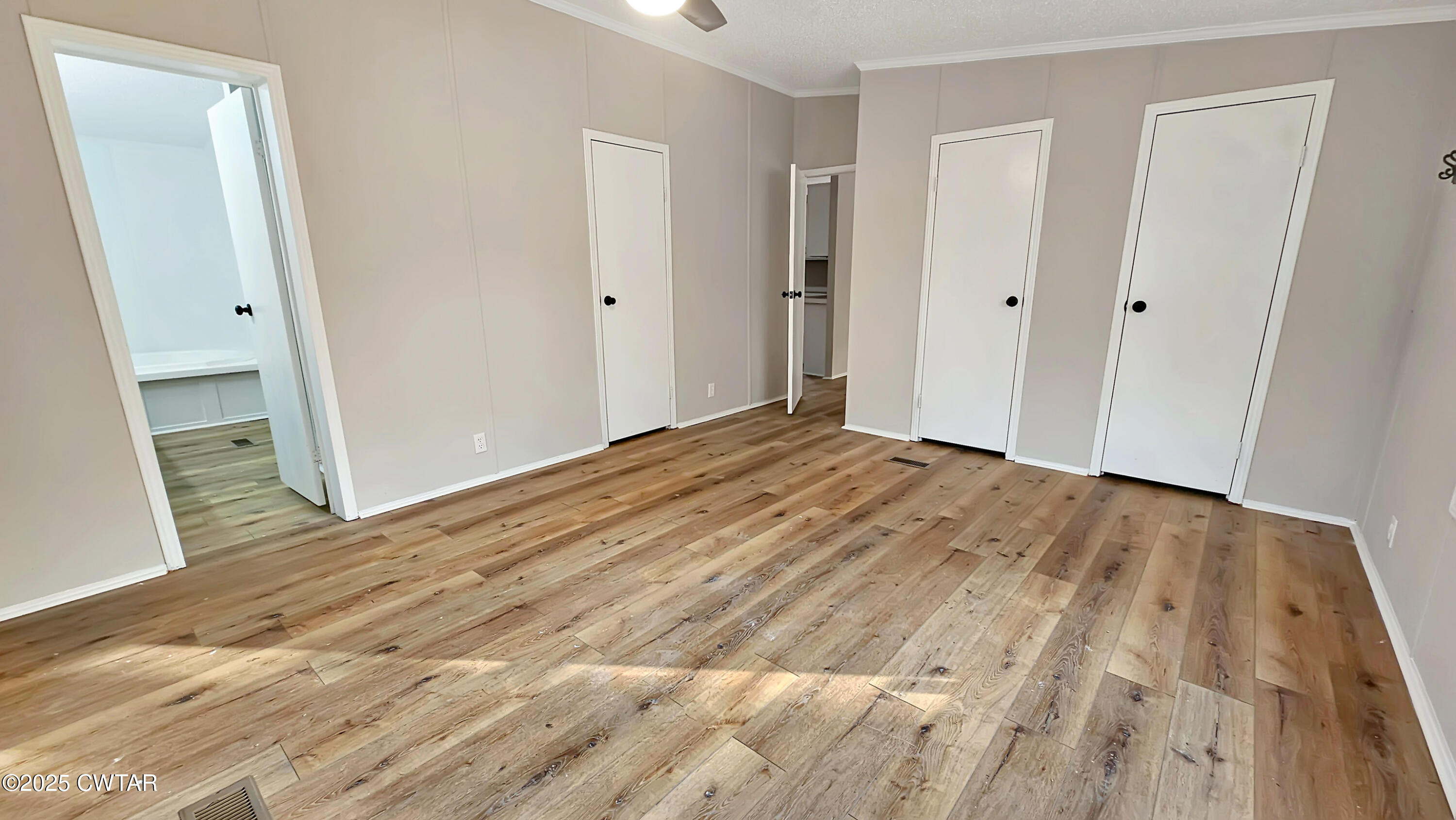 5427 Shades Bridge Road McKenzie, TN 38201 - Photo 11 of 35 a view of empty room with wooden floor