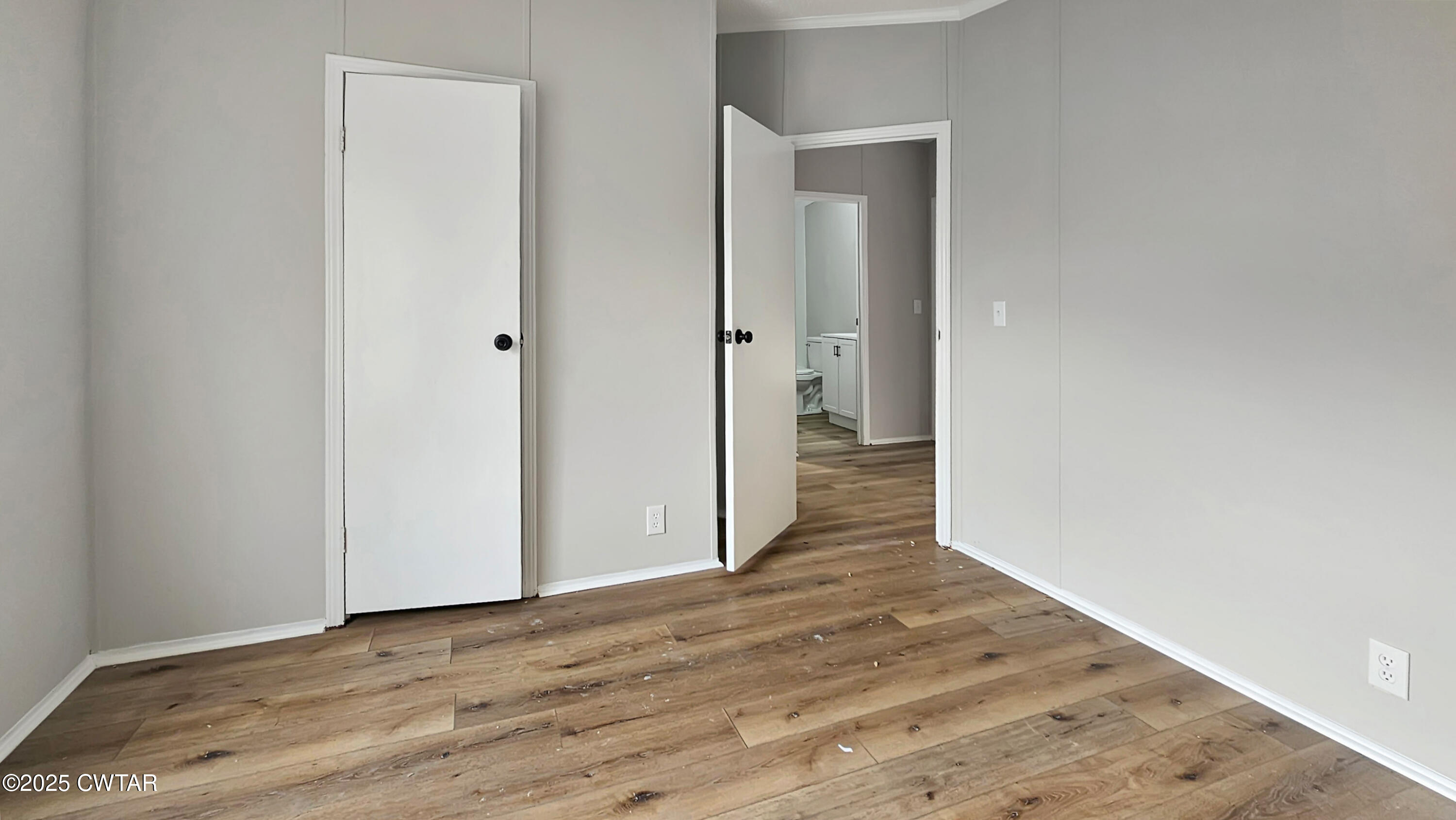 5427 Shades Bridge Road McKenzie, TN 38201 - Photo 15 of 35 a view of a hallway with wooden floor