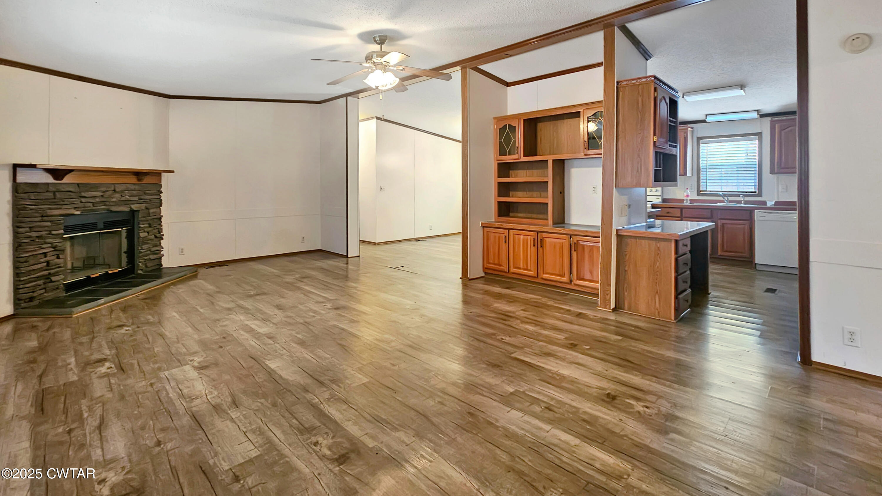 5427 Shades Bridge Road McKenzie, TN 38201 - Photo 24 of 35 a view of kitchen with furniture and wooden floor