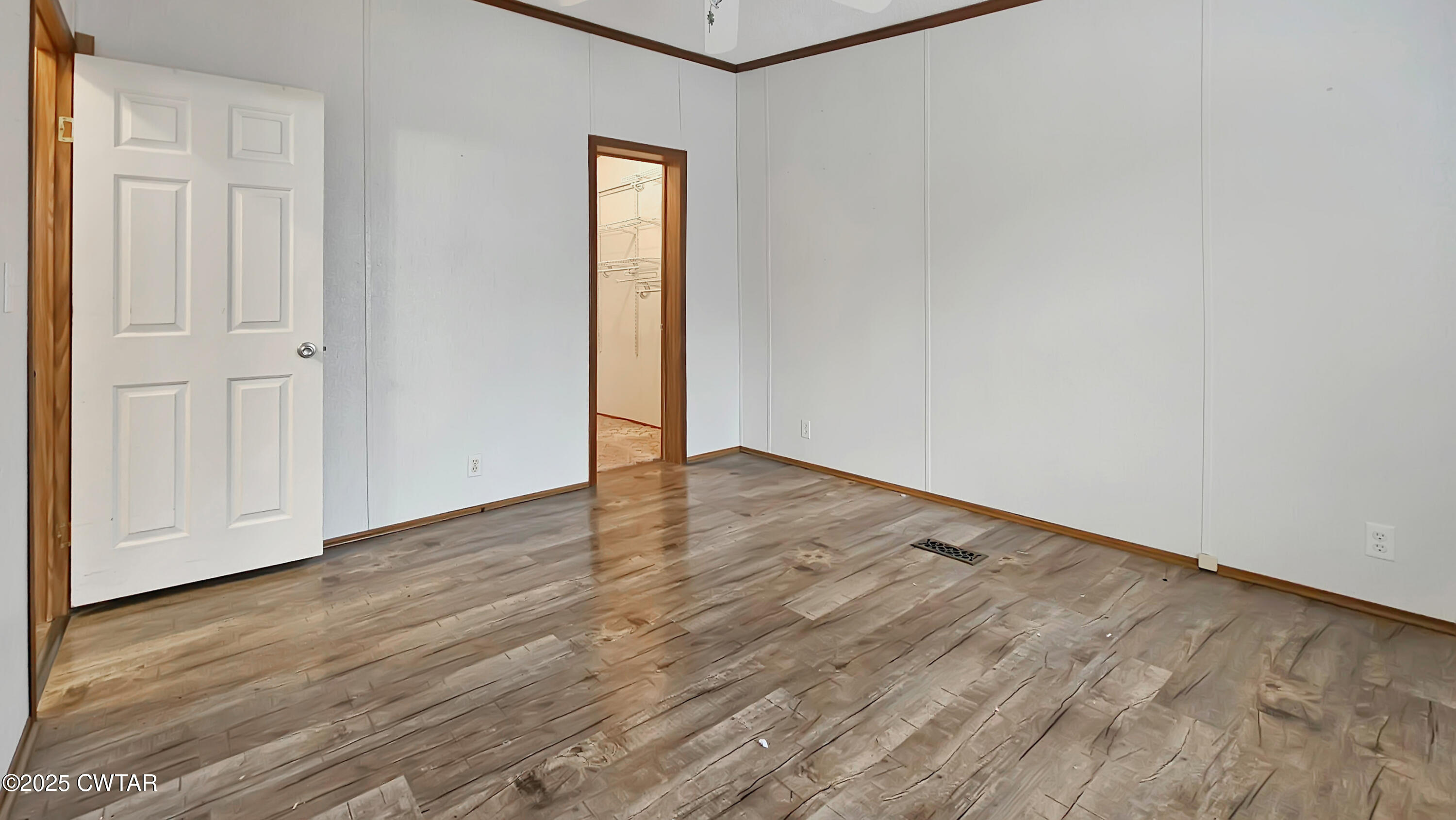 5427 Shades Bridge Road McKenzie, TN 38201 - Photo 29 of 35 a view of an empty room with wooden floor