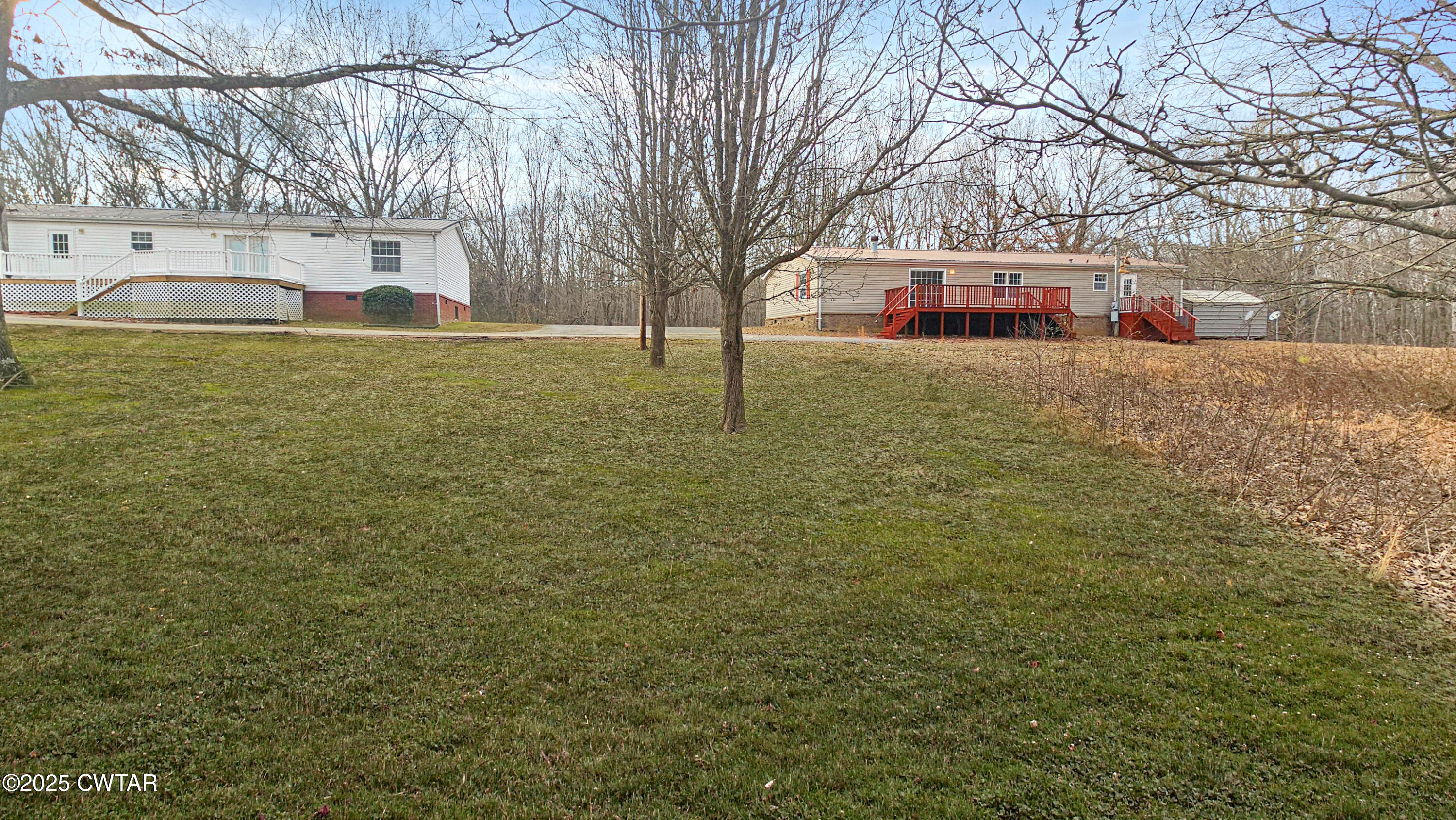 5427 Shades Bridge Road McKenzie, TN 38201 - Photo 32 of 35 a picture of street with trees