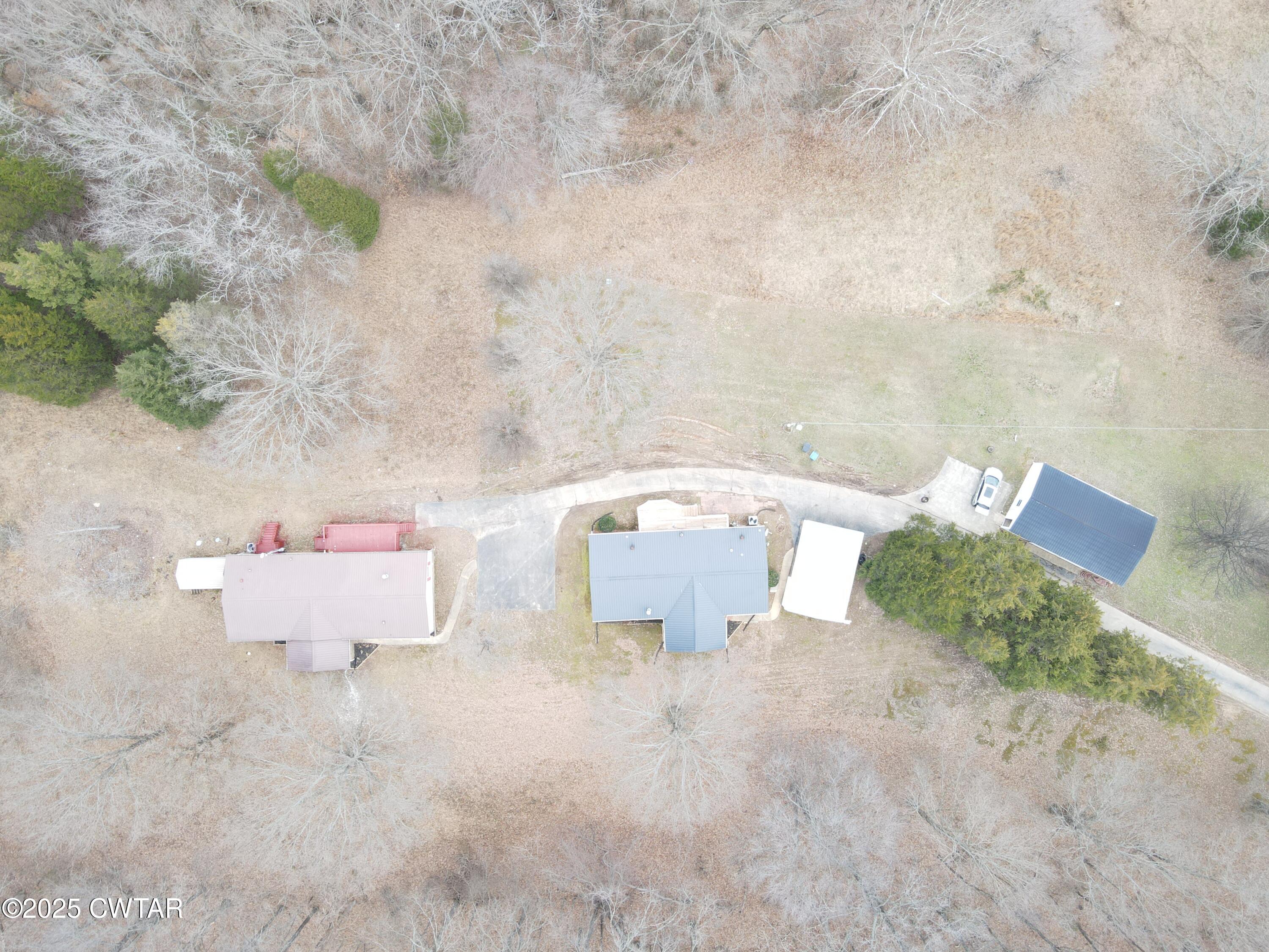 5427 Shades Bridge Road McKenzie, TN 38201 - Photo 34 of 35 an aerial view of a house with outdoor space