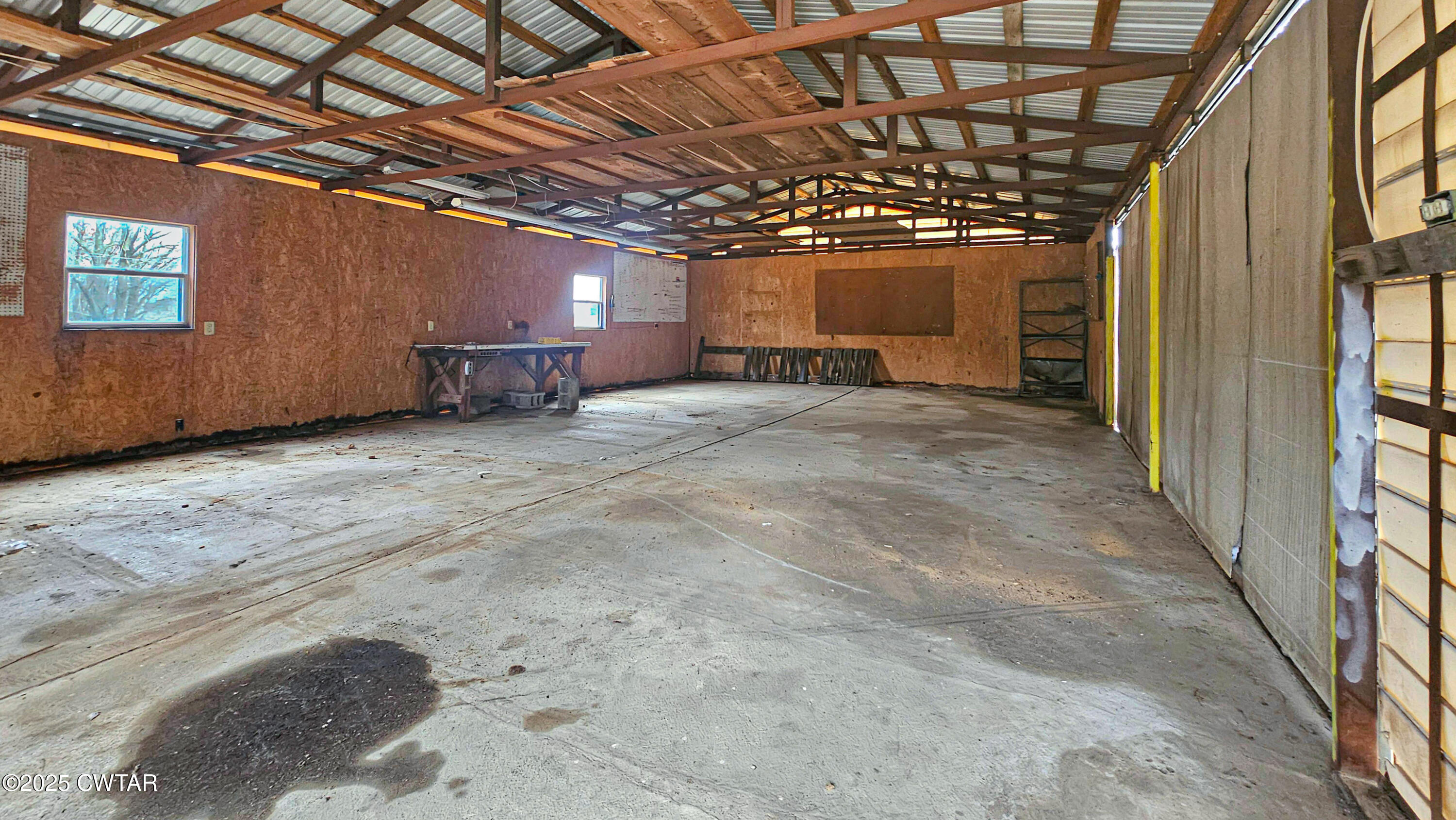 5427 Shades Bridge Road McKenzie, TN 38201 - Photo 6 of 35 a view of a room with wooden walls