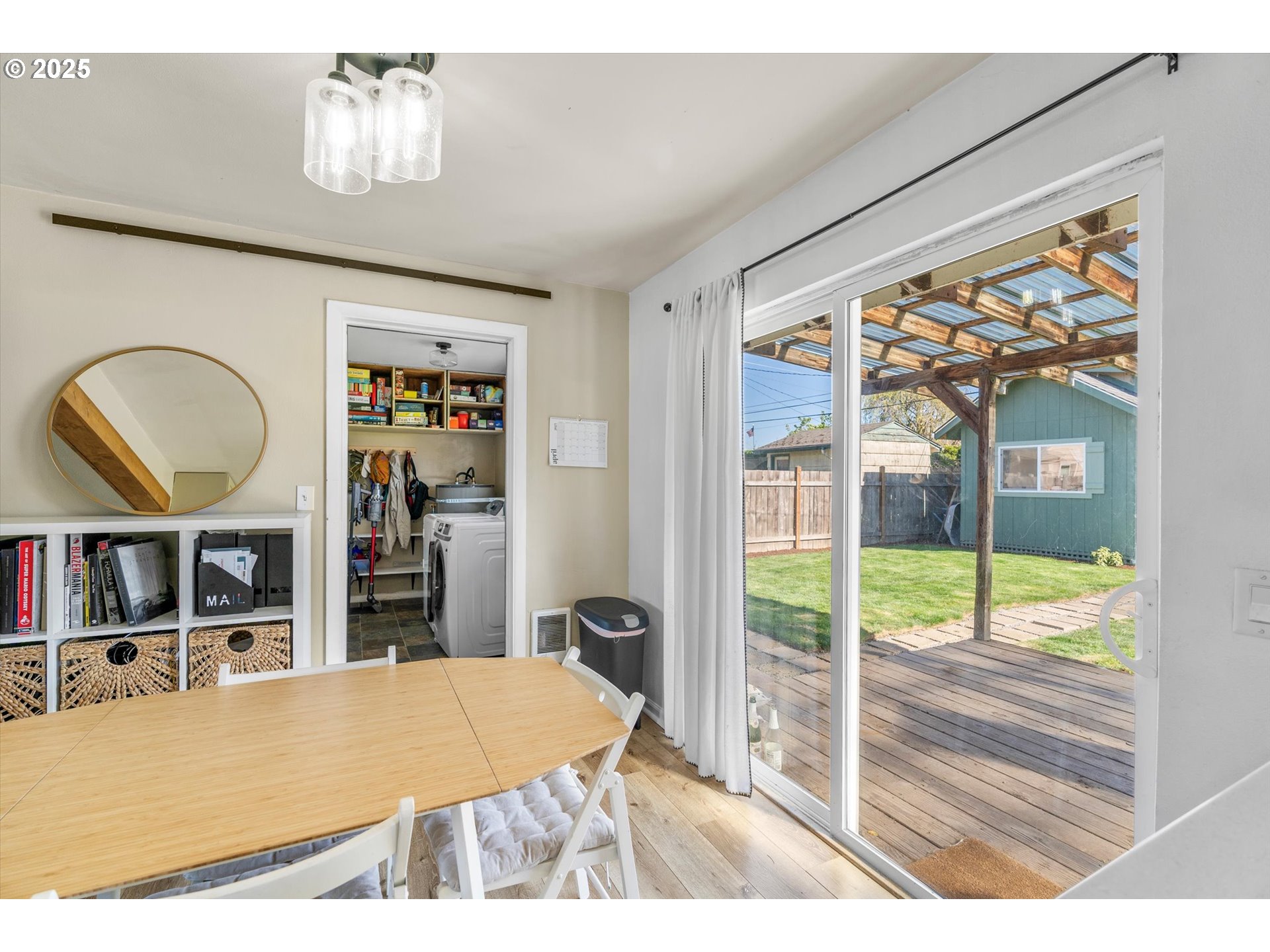 1379 Olympic Street Springfield, OR 97477 - Photo 12 of 33 a view of a livingroom with furniture window and wooden floor
