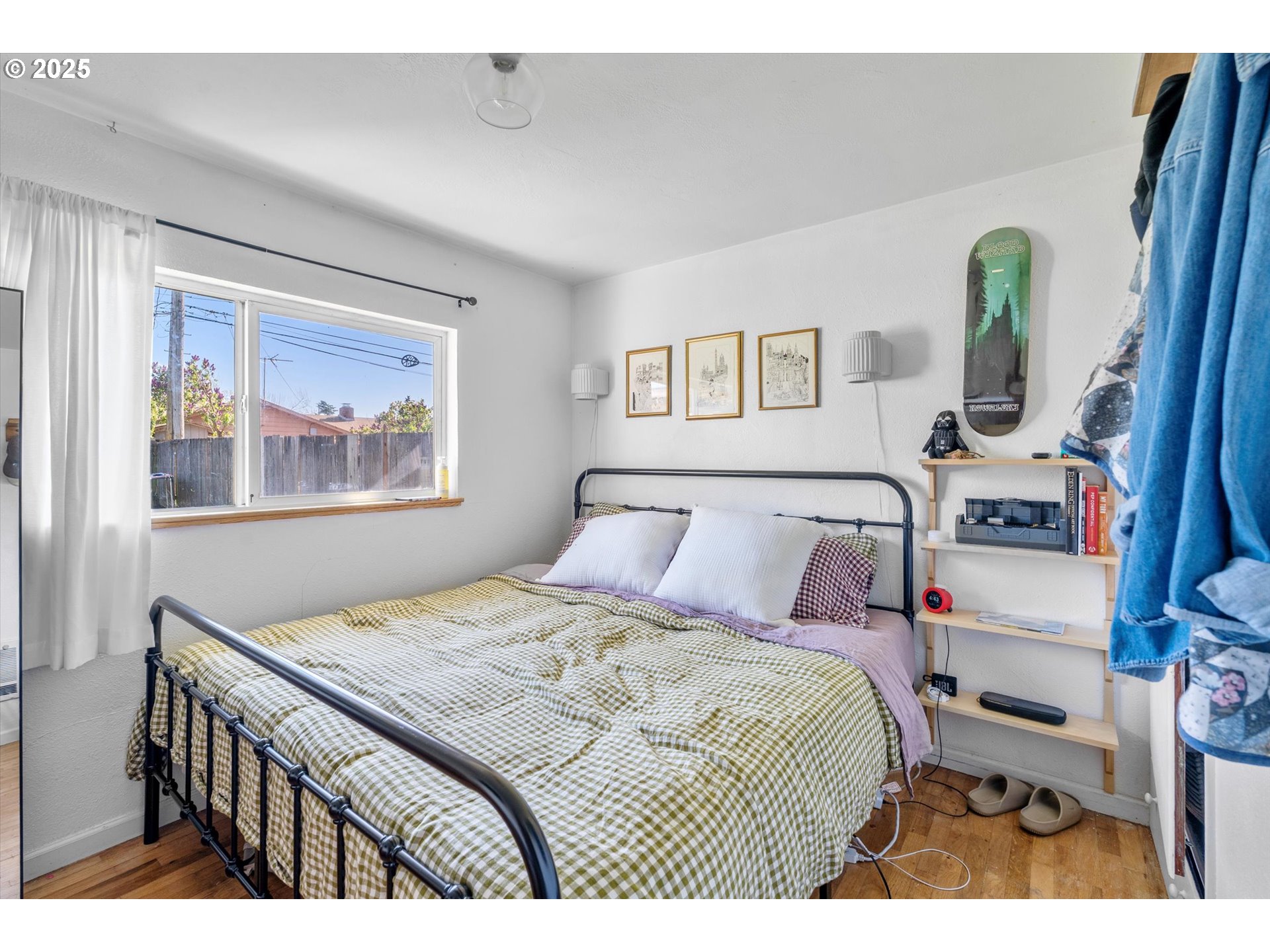 1379 Olympic Street Springfield, OR 97477 - Photo 18 of 33 a bedroom with a bed and a painting on the wall
