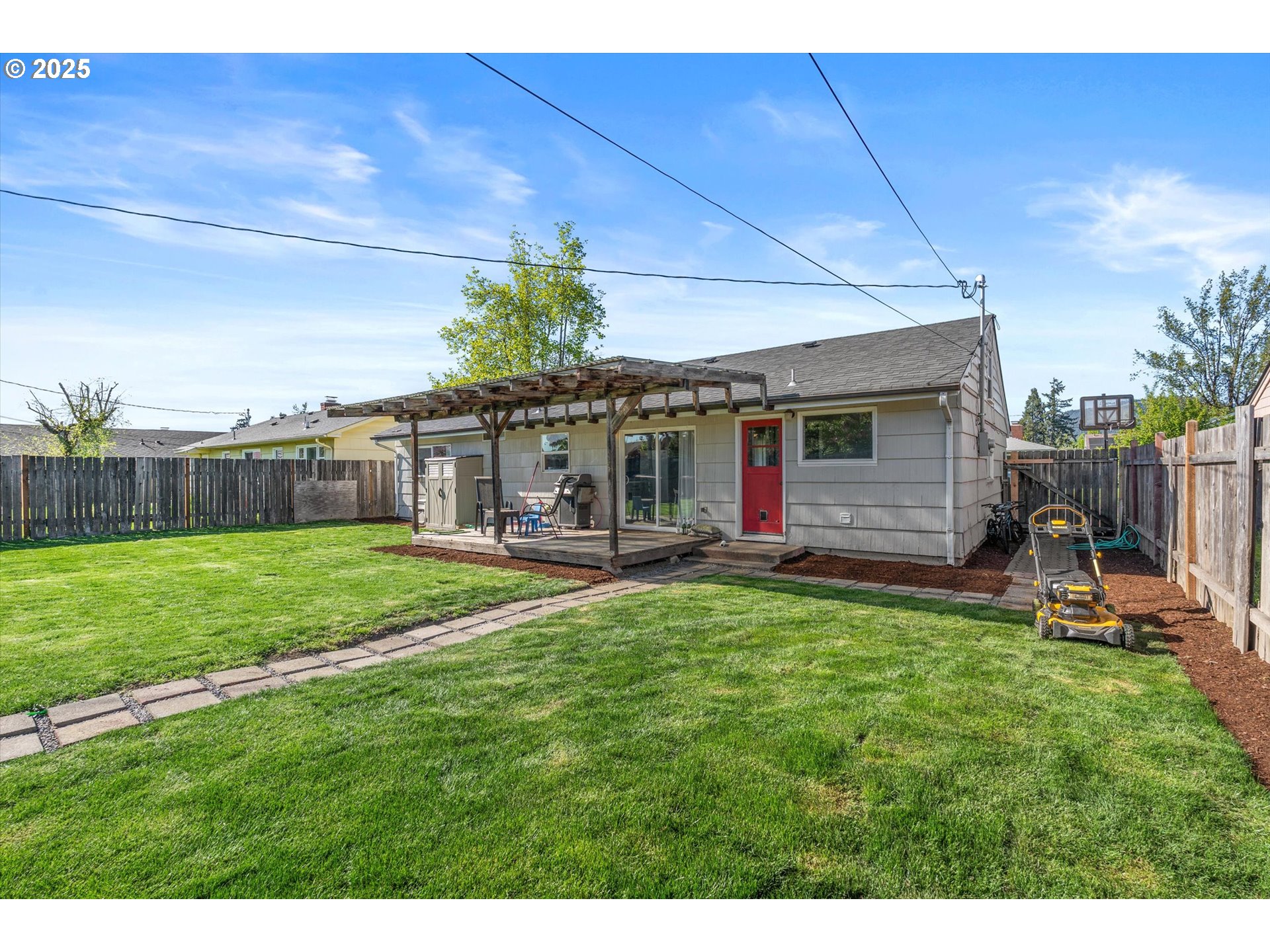 1379 Olympic Street Springfield, OR 97477 - Photo 25 of 33 a view of a house with backyard and porch