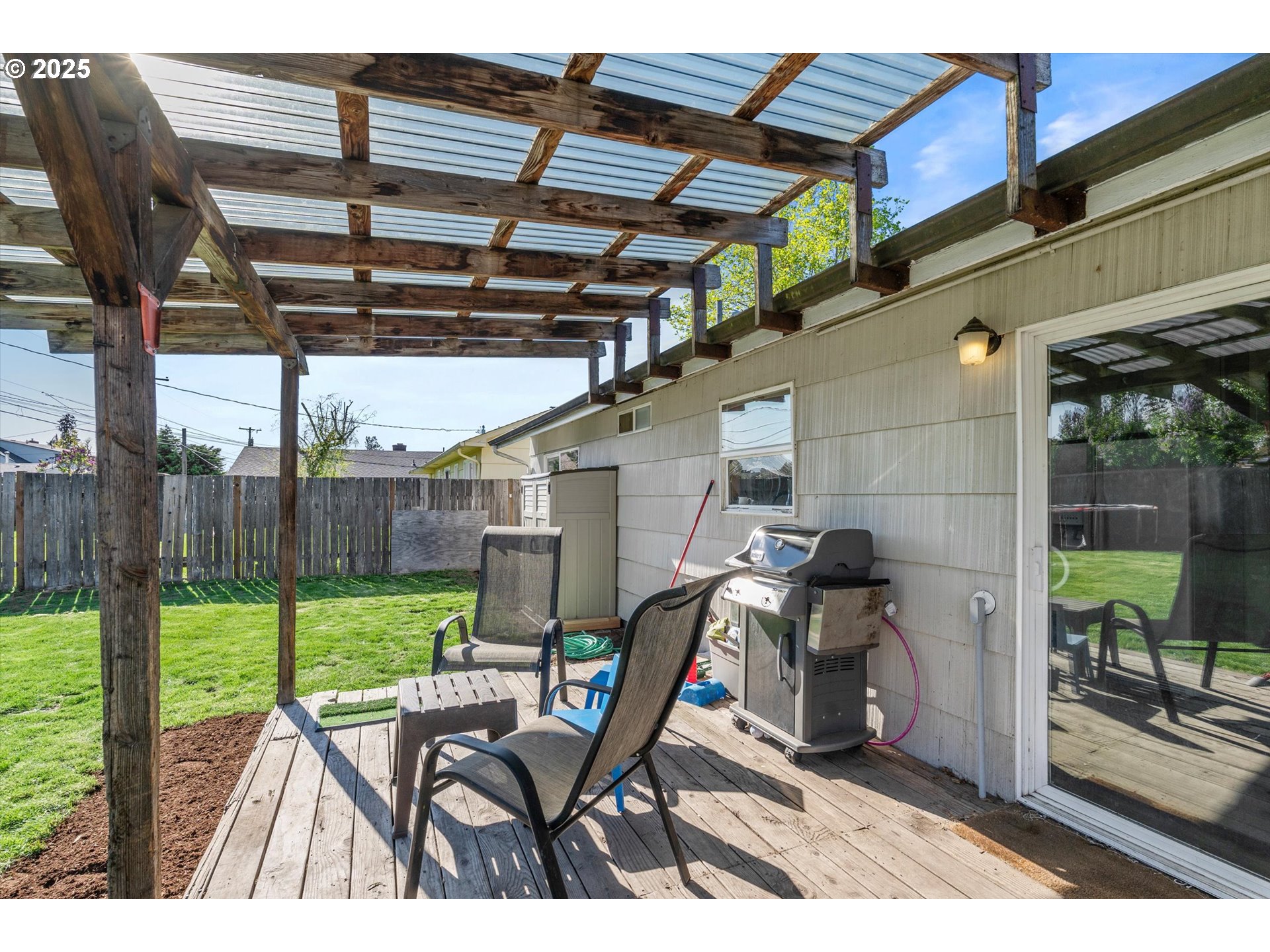 1379 Olympic Street Springfield, OR 97477 - Photo 26 of 33 a view of a chairs and table in a patio