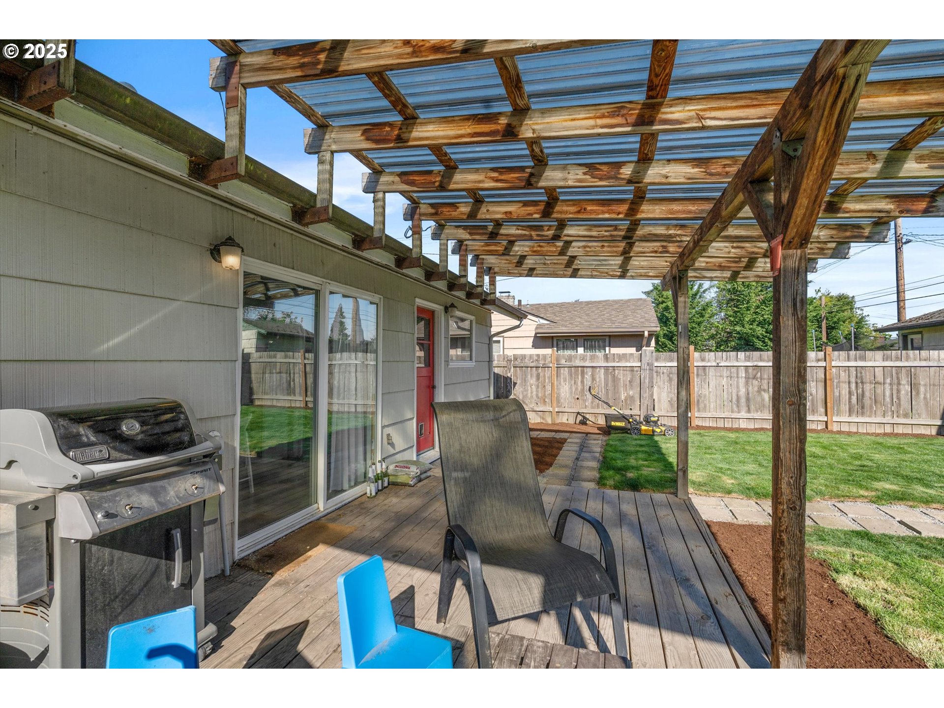 1379 Olympic Street Springfield, OR 97477 - Photo 27 of 33 a view of a porch with furniture and wooden floor