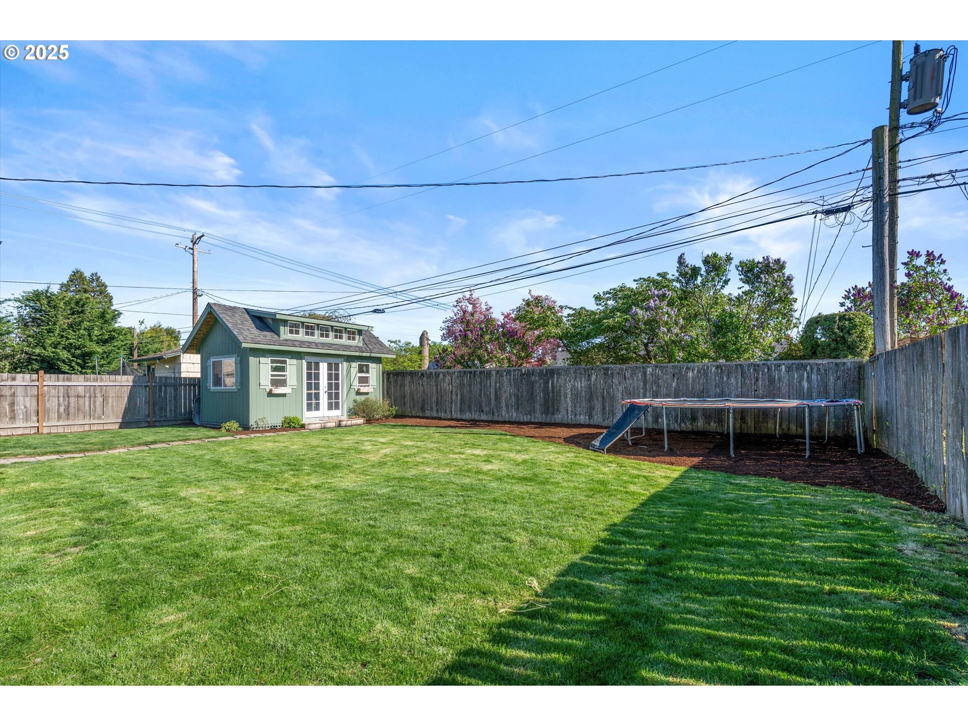 1379 Olympic Street Springfield, OR 97477 - Photo 28 of 33 a view of a backyard with a garden and deck