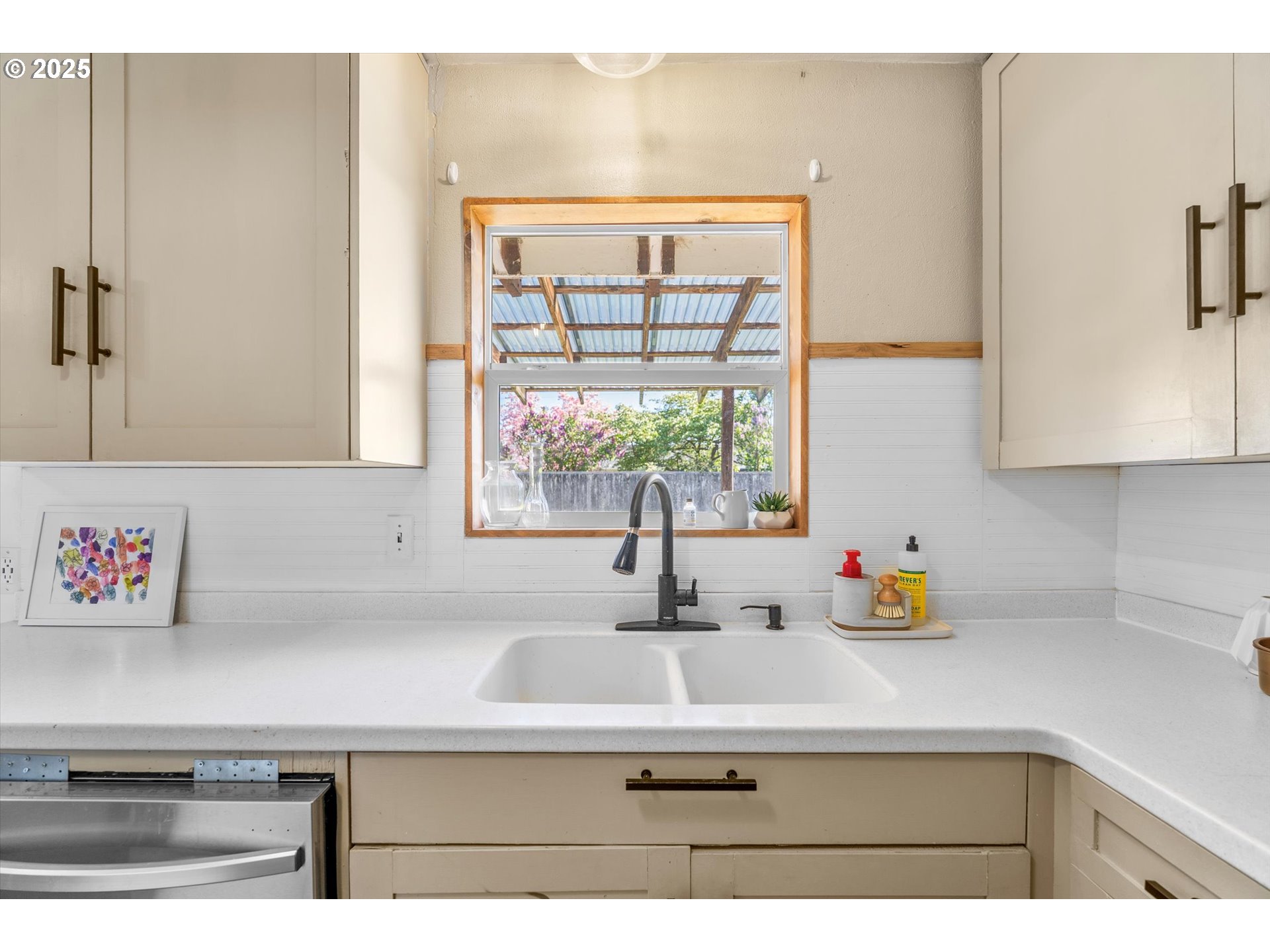 1379 Olympic Street Springfield, OR 97477 - Photo 9 of 33 a bathroom with a sink and a window