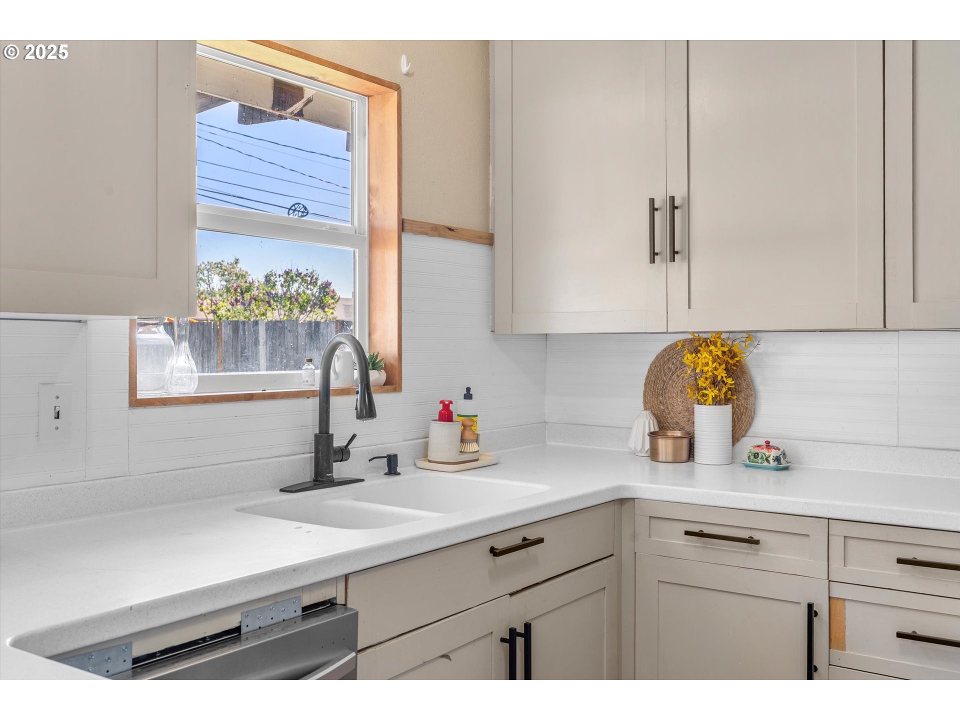 1379 Olympic Street Springfield, OR 97477 - Photo 10 of 33 a kitchen with a sink and cabinets