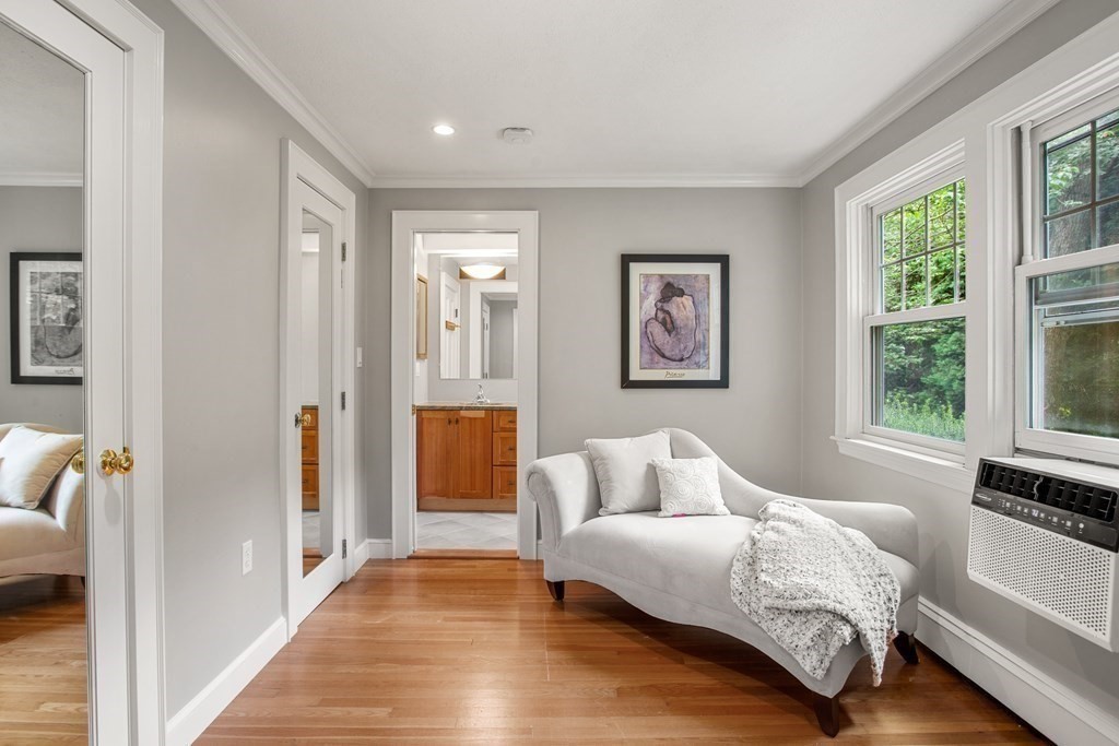 7 Phinney Road Lexington, MA 02421 - Photo 24 of 30 a bedroom with a bed and a couch