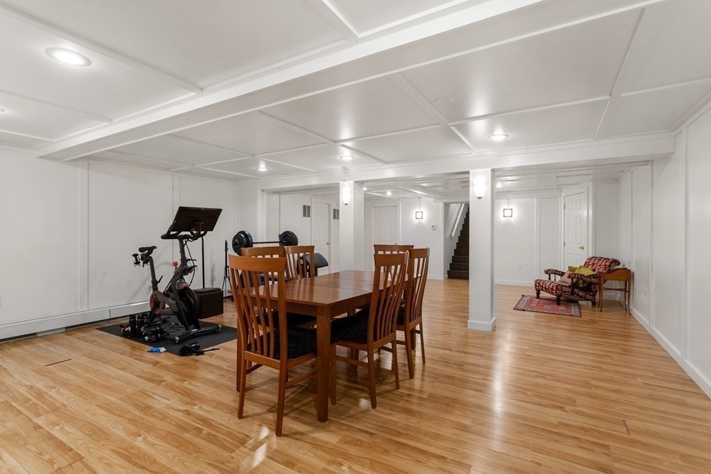 7 Phinney Road Lexington, MA 02421 - Photo 28 of 30 a view of a dining room with furniture and wooden floor