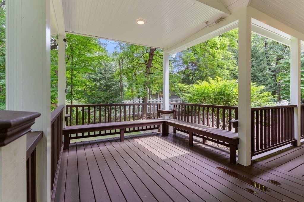 7 Phinney Road Lexington, MA 02421 - Photo 29 of 30 a view of a wooden deck with a yard and wooden floor