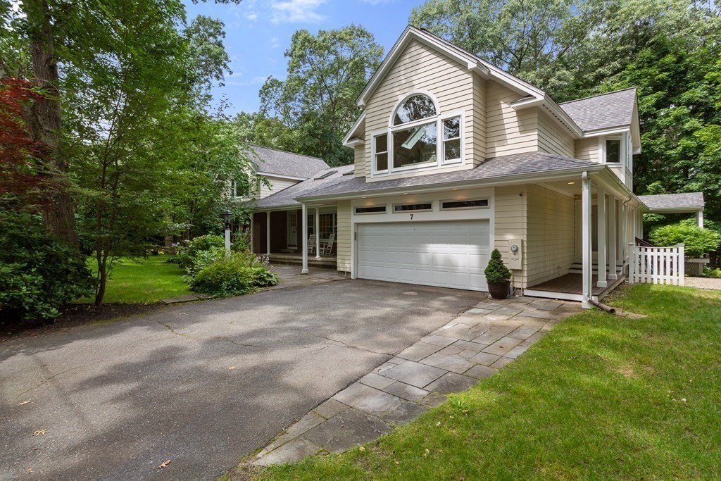 7 Phinney Road Lexington, MA 02421 - Photo 30 of 30 a front view of a house with a yard and garage