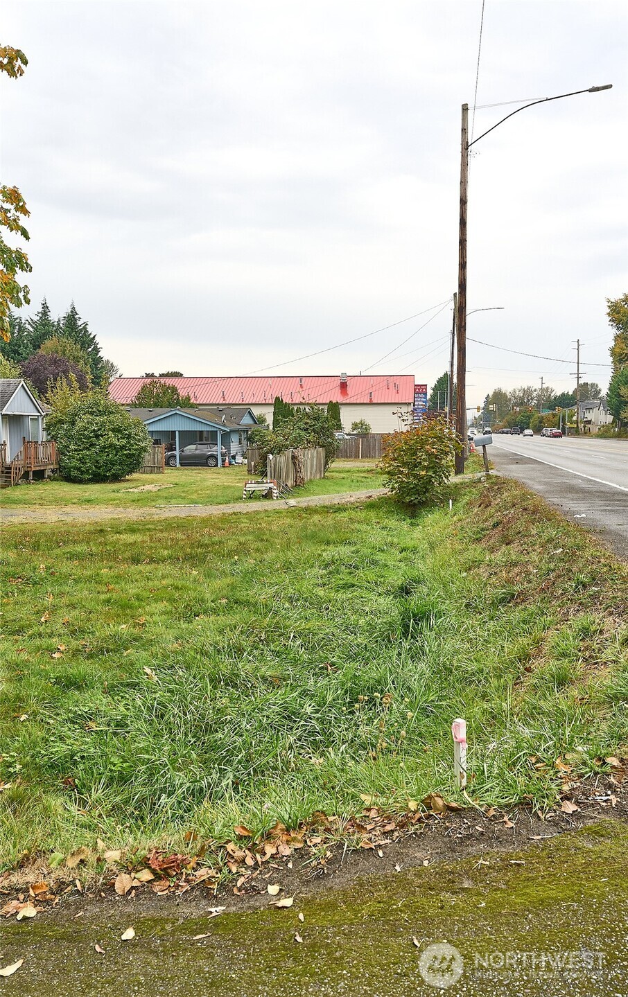54-xx Northeast 4th Street Renton, WA 98059 - Photo 3 of 13 a view of a lake with a big yard