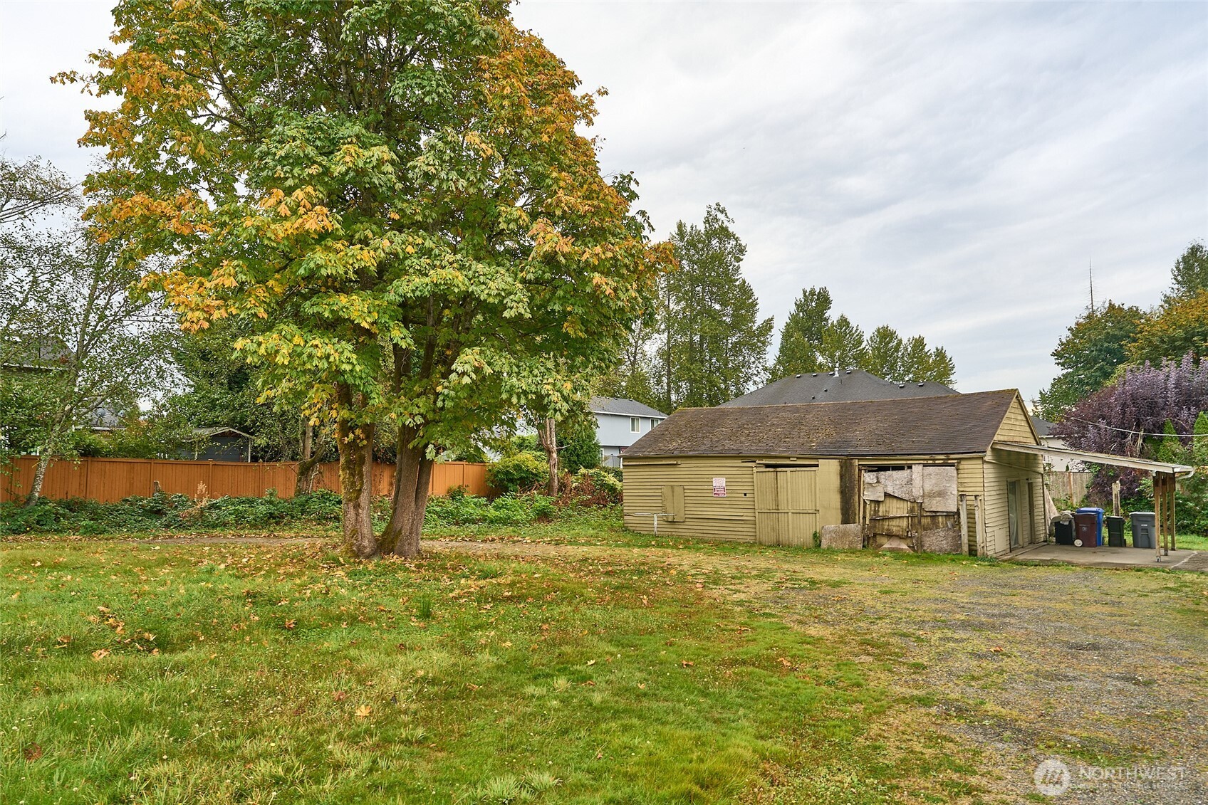 54-xx Northeast 4th Street Renton, WA 98059 - Photo 10 of 13 a view of a house with a yard