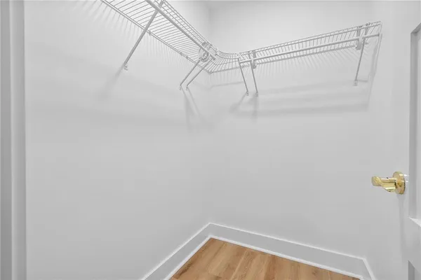 a view of a room with racks on the wall