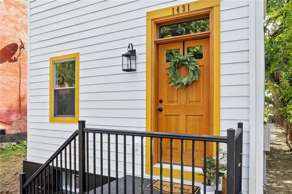 a view of a porch with a door