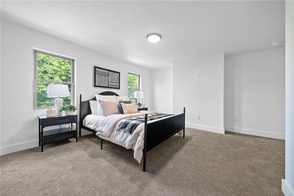 1431 Adams Street Pittsburgh, PA 15233 - Photo 24 of 42 a bed room with a bed and a window