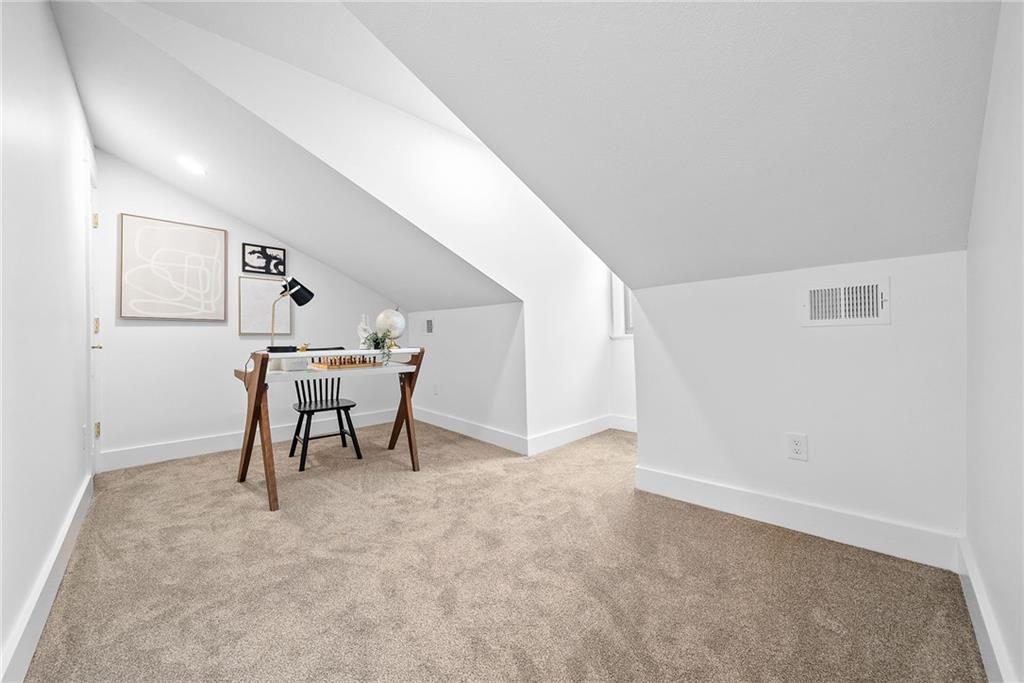 1431 Adams Street Pittsburgh, PA 15233 - Photo 29 of 42 a workspace with furniture and closet