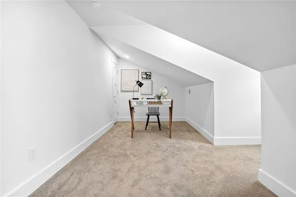 a room with a table and a chair