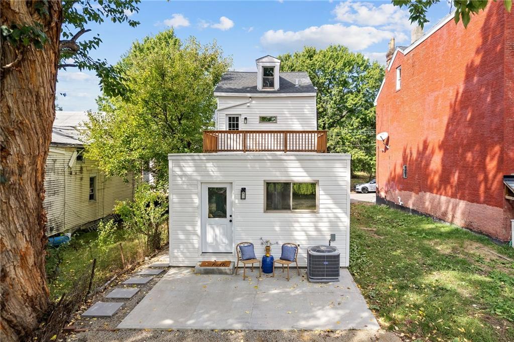 1431 Adams Street Pittsburgh, PA 15233 - Photo 34 of 42 a front view of a house with a yard
