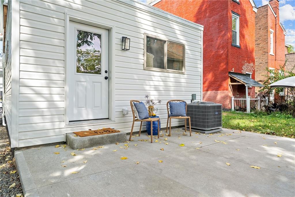1431 Adams Street Pittsburgh, PA 15233 - Photo 35 of 42 a backyard of a house with outdoor seating