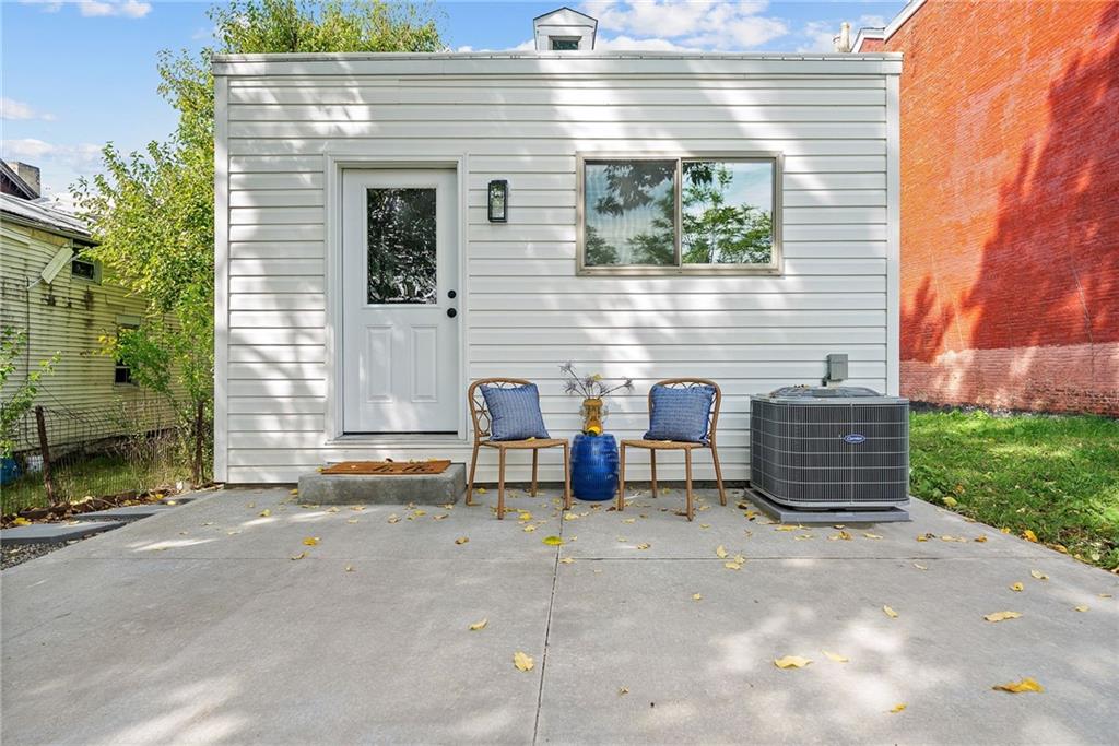 1431 Adams Street Pittsburgh, PA 15233 - Photo 36 of 42 a view of a chairs with a table in the patio